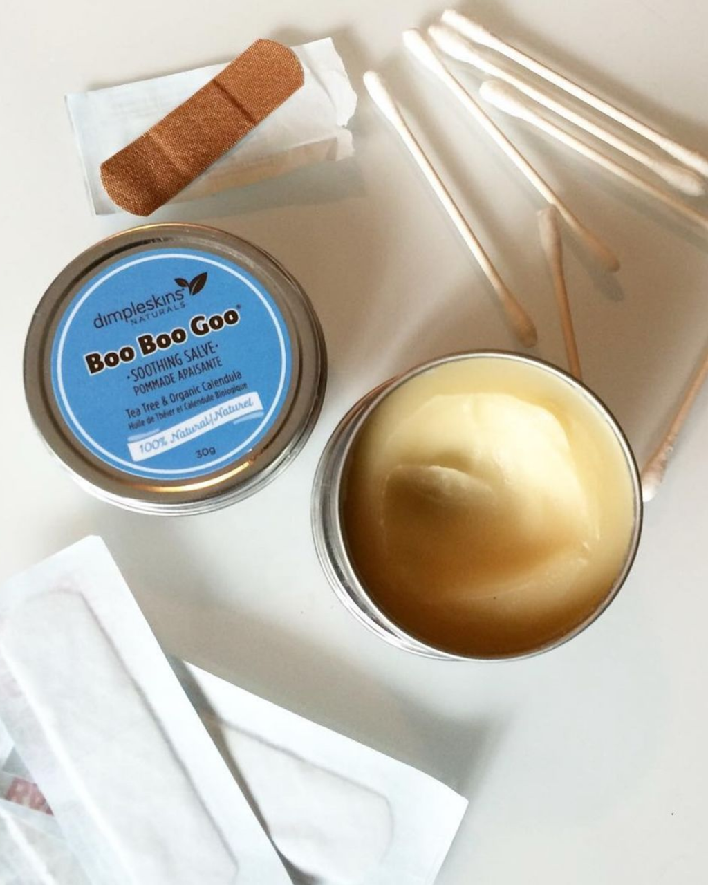 Dimpleskins Boo Boo Goo Soothing Salve 30g tin. Natural botanical salve for minor irritations, itchy bites, sunburns, natural first aid — made in Canada